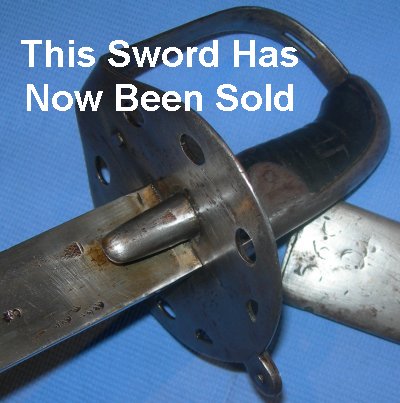 Unmodified disc hilt with langets intact